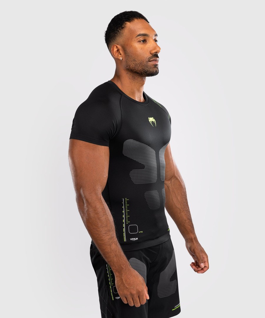 venum training camp 4.0 lyhythihainen rashguard - mustaneonvihreä