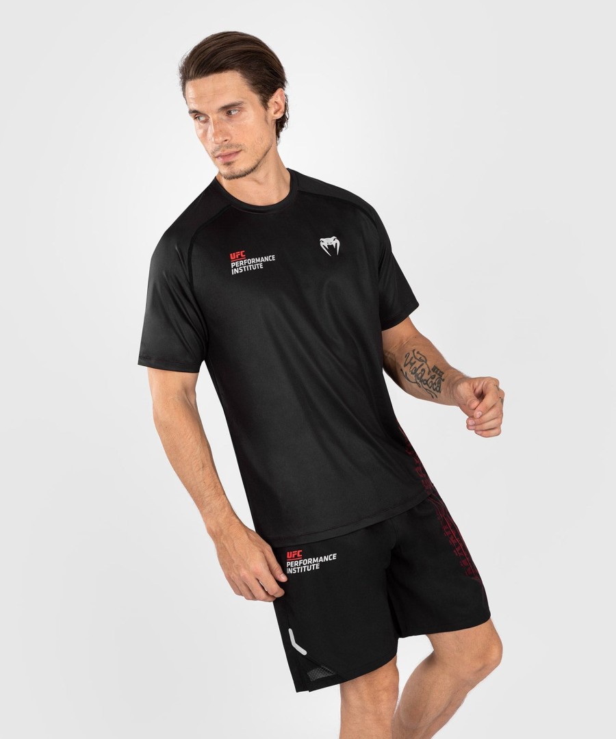 ufc venum performance institute 2.0 miesten dry-tech paita - mustapunainen