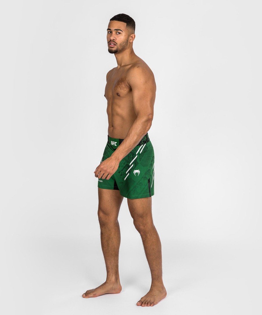 ufc adrenaline by venum authentic fight night miesten kamppailushortsit - lyhyt istuvuus - vihreä