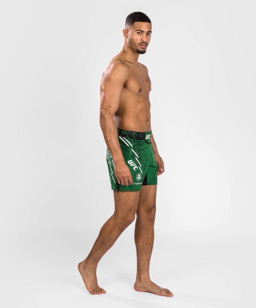 ufc adrenaline by venum authentic fight night miesten kamppailushortsit - lyhyt istuvuus - vihreä