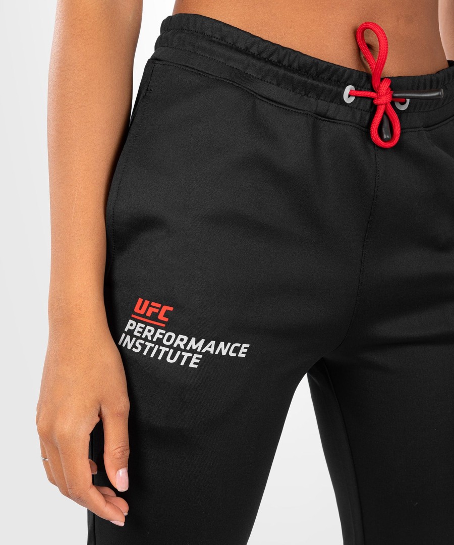 ufc venum performance institute 2.0 naisten verryttelyhousut - mustapunainen