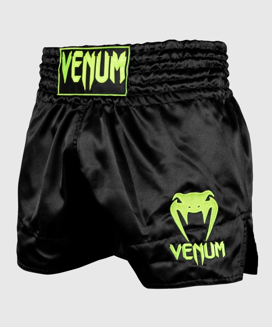 venum classic muay thai -shortsit - mustafluoresoiva keltainen
