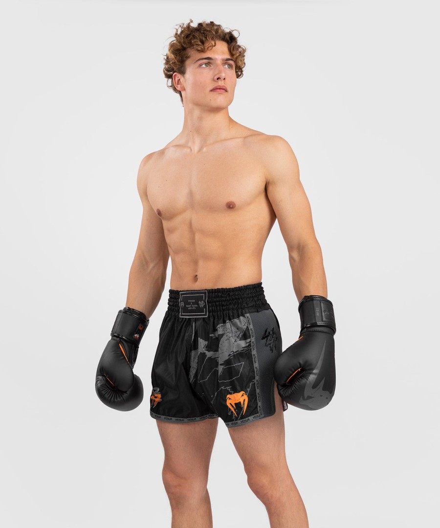 venum s47 muay thaï short - mustaoranssi