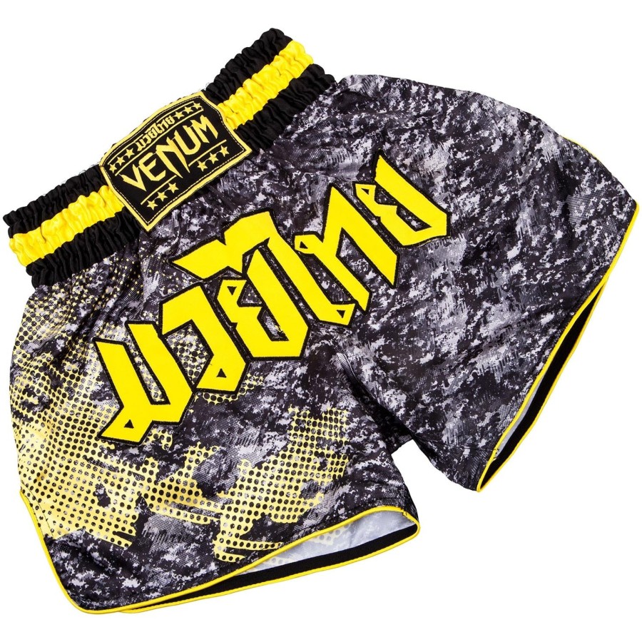 venum tramo muay thai -shortsit - mustakeltainen