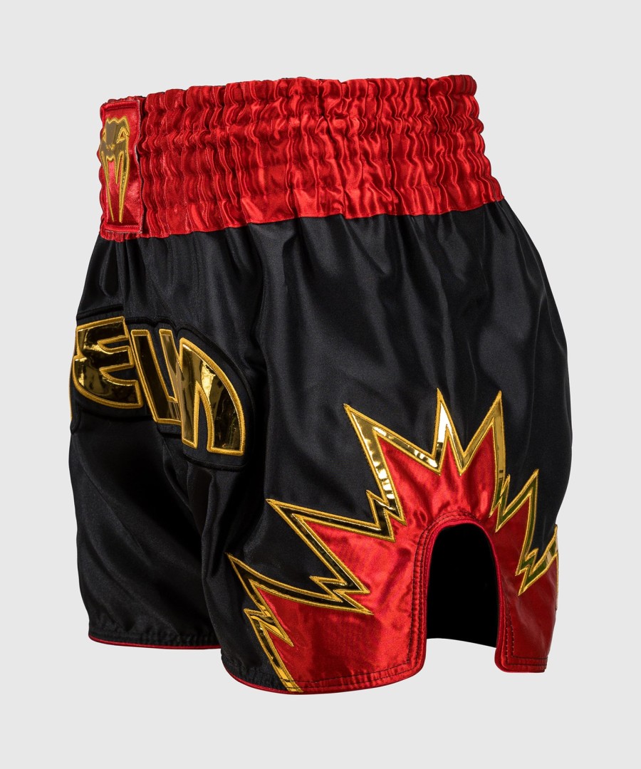 venum inferno muay thai shortsit - mustakultapunainen
