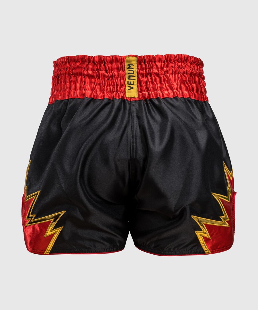 venum inferno muay thai shortsit - mustakultapunainen