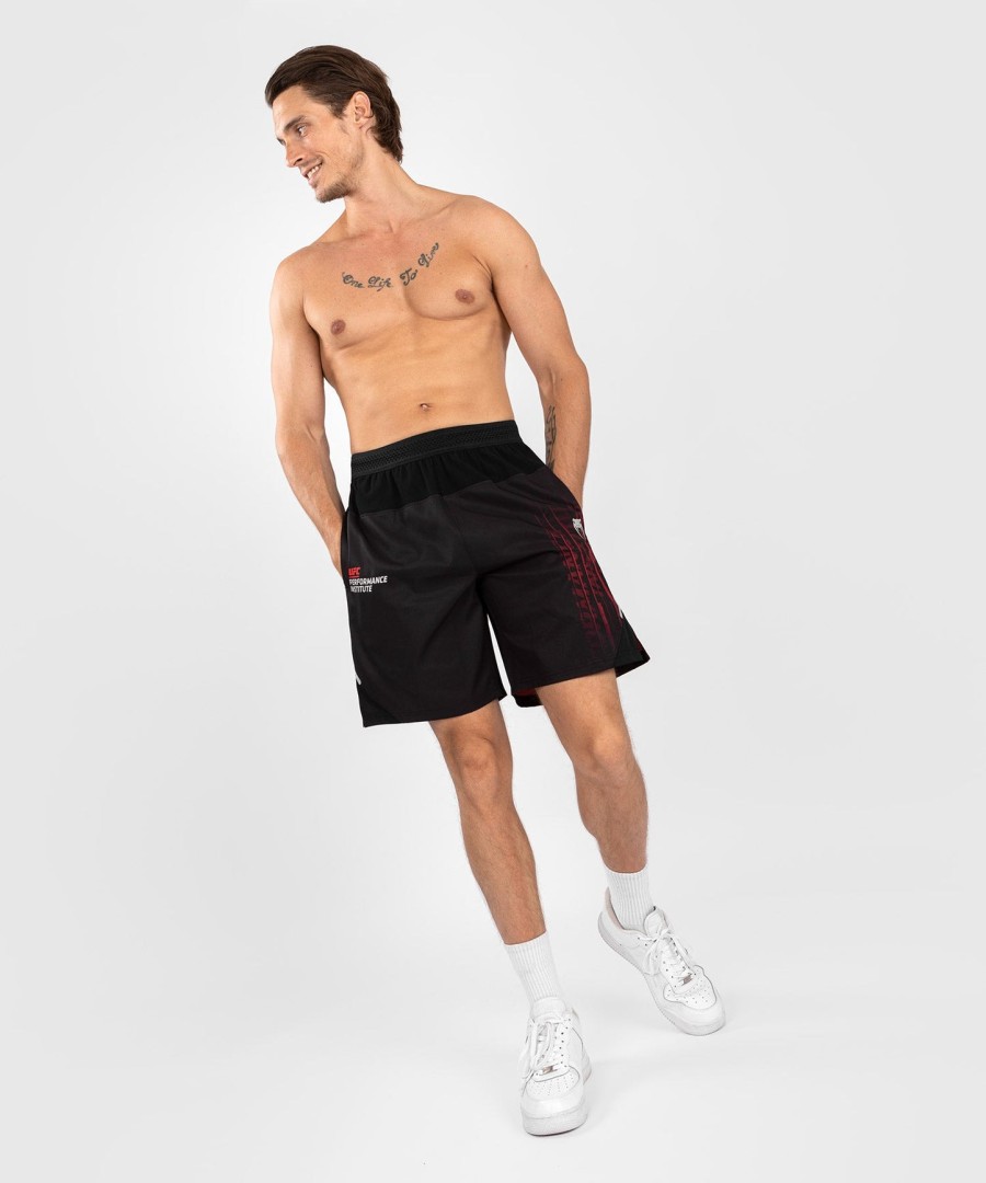 ufc venum performance institute 2.0 miesten performance shortsit - mustapunainen